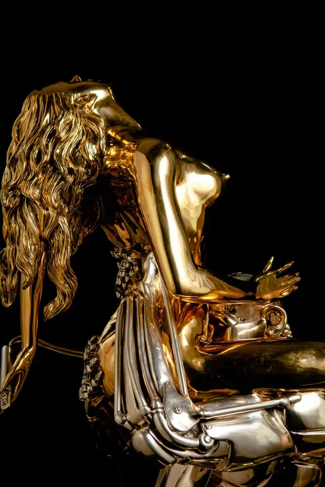Escultura de bronce